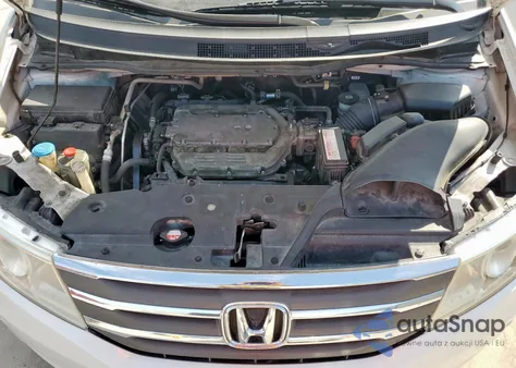 2012 Honda Odyssey Touring z USA, uszkodzony, nr VIN 5FNRL5H91CB141079